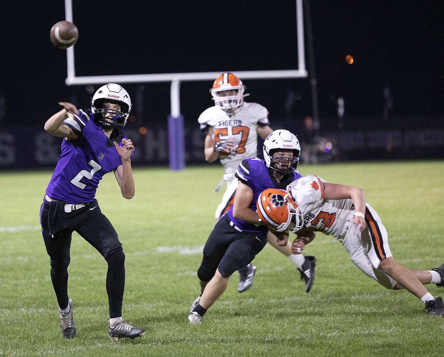 Dixon’s Cullen Shaner fires a pass against Byron Friday, Oct. 18, 2024, at A.C. Bowers Field in Dixon.