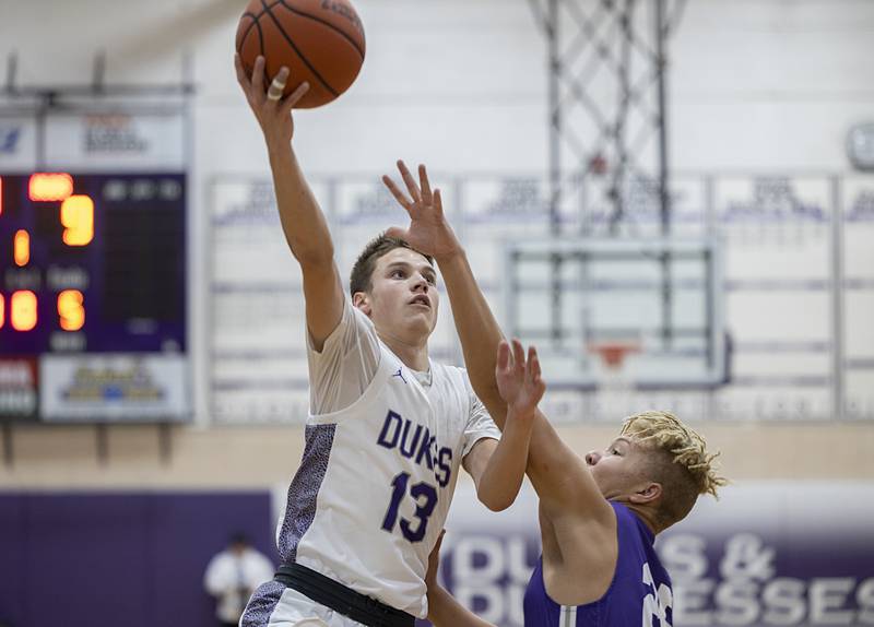 Dixon’s Cullen Shaner puts up a shot Monday, Dec. 5, 2022 in a game against Rochelle.