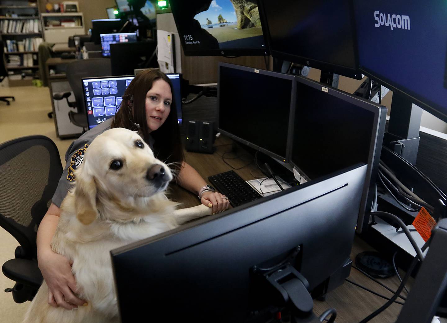 Northeast Regional Communications Center dispatcher Tracy McNamara, with Oakley, inside the center on Tuesday, April 16, 2024.