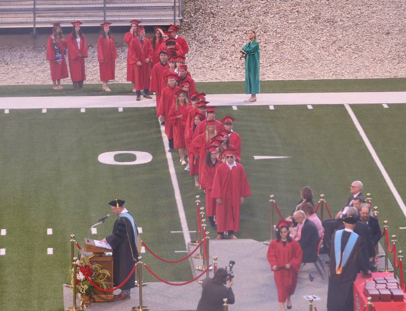 La Salle-Peru Township High School class of 2024 students gather in line to receive their diplomas for the 126th annual commencement graduation ceremony on Thursday, May 16, 2024 in Howard Fellows Stadium.