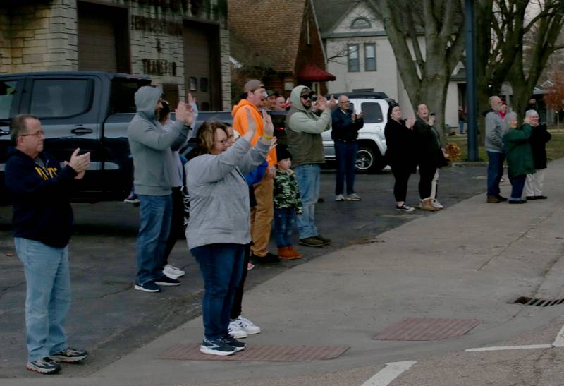 Supporters line West Walnut Street to support the Oglesby Washington 7th grade basketball team as they attend the Illinois Elementary School Association Class 2A State championship on Thursday, Feb. 8, 2024 at Oglesby Washington School. Oglesby plays Effingham for the Class 2A State Title.