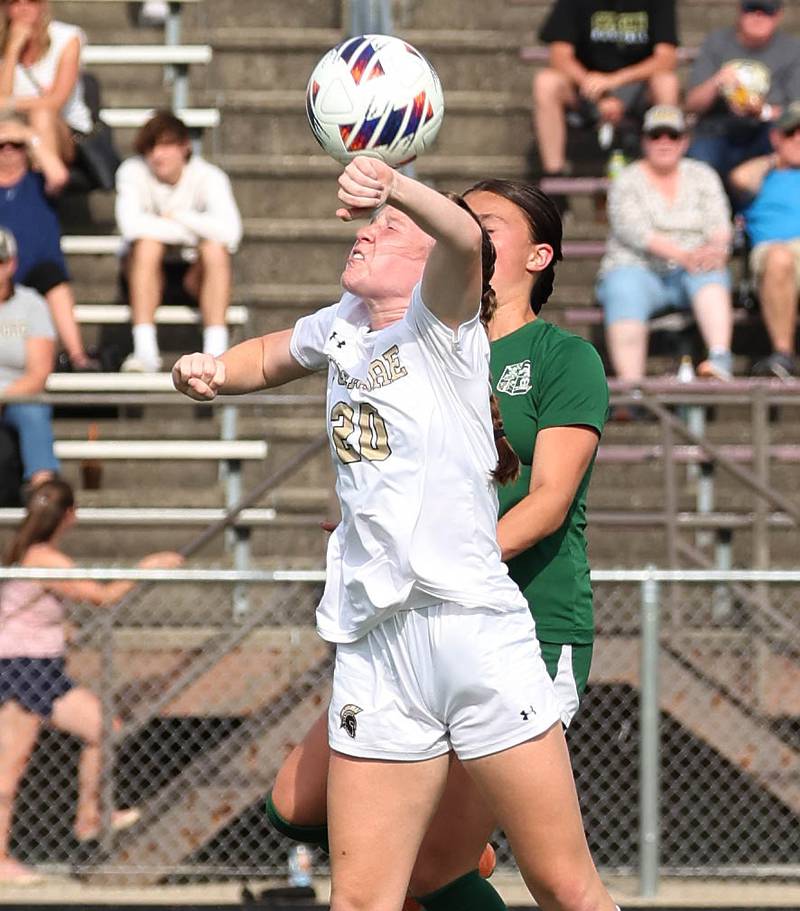 Sycamore's Cortni Kruizenga heads the ball in front of Boylan's Ava Galluzzo during their Class 2A sectional semifinal game Tuesday, May 21, 2024, at Belvidere High School.