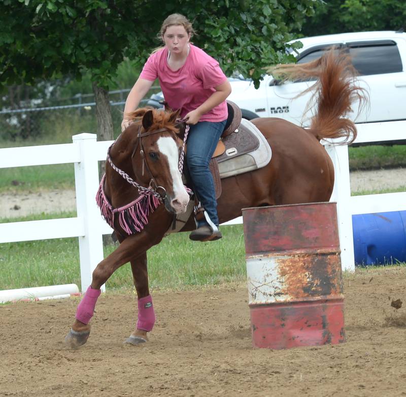 Lexi Moan, 16, of Amboy turns Digger in the 18-under barrel competition at the WHOA benefit horse show on Saturday, June 22, 2024 at the Whiteside County fairgrounds in Morrison.