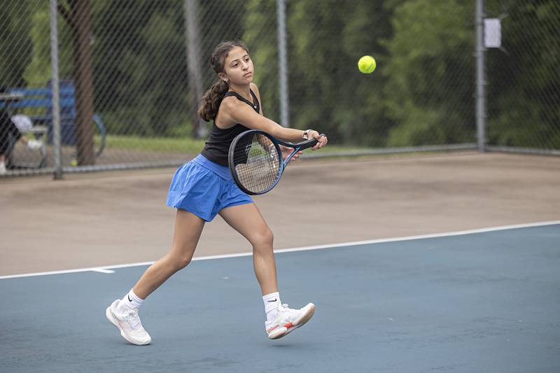 Meerna Elbzour plays the ball Wednesday, July 27, 2023 while playing mixed doubles in the Emma Hubbs Tennis Classic in Dixon.