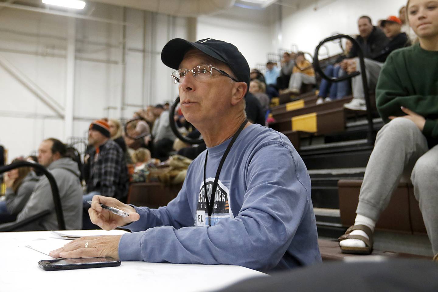 Northwest Herald sports reporter Joe Stevenson takes notes as he reports during a Fox Valley Conference boys basketball game between McHenry and Jacobs on Wednesday, Nov. 29, 2023, at Jacobs High School in Algonquin. Stevenson is retiring after working for Shaw Media for 35 years.