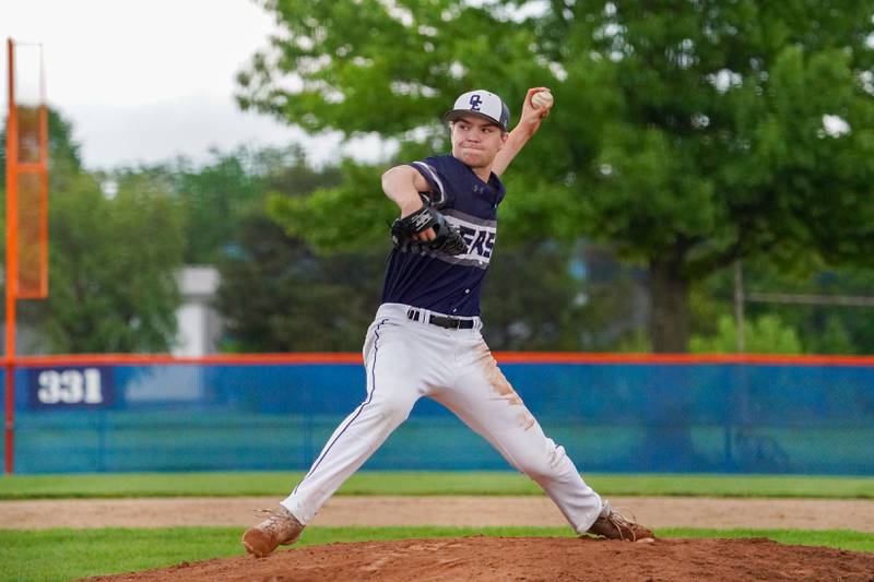 Oswego East's Allen Chorba (32) delivers a pitch against Oswego during a baseball game at Oswego High School on Monday, May 13, 2024.