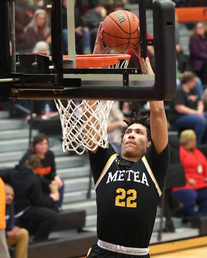 Metea Valley's Will Ashford gets ahead the DeKalb defense for a dunk during their game Friday, Jan. 19, 2024, at DeKalb High School.