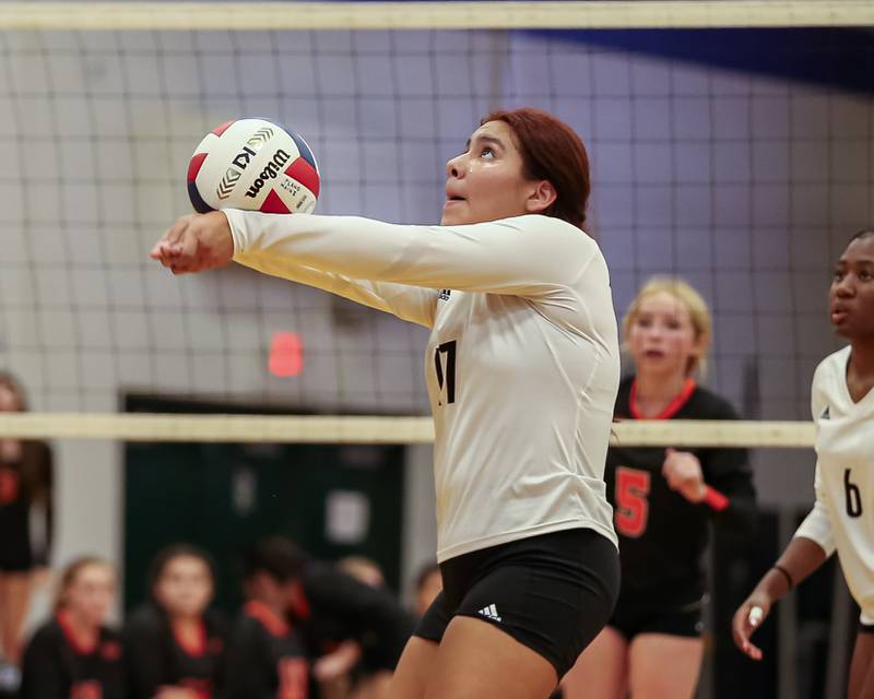 Plano's Rita Lauro (17) with a dig save during volleyball match between Sandwich at Plano.  August 21, 2023.