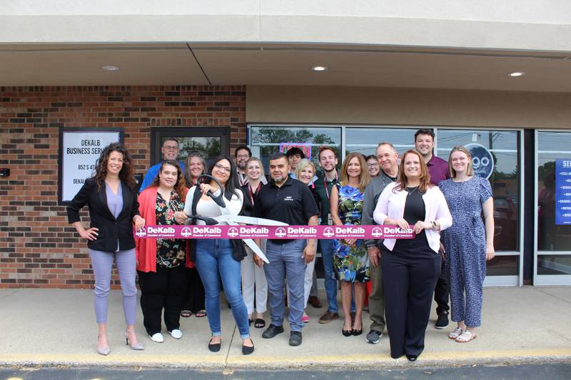 The DeKalb Chamber of Commerce celebrating DeKalb Business Services opening