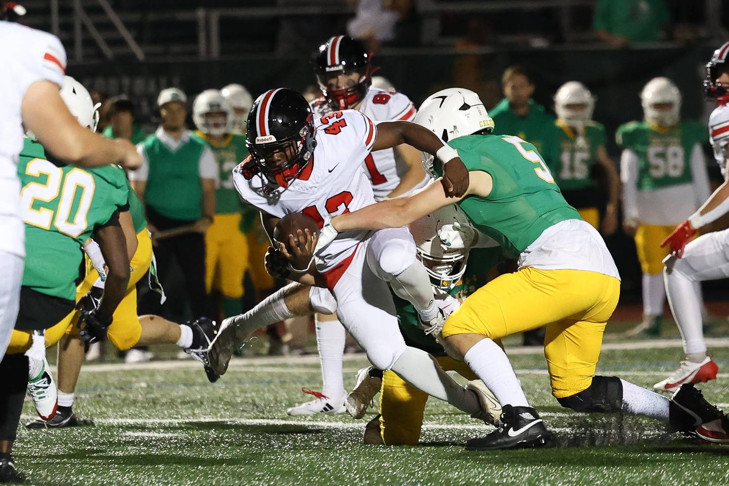 Lincoln-Way Central’s Justin Cobbs powers forward for extra yards on a run against Providence on Friday, Sept. 6, 2024 in New Lenox.