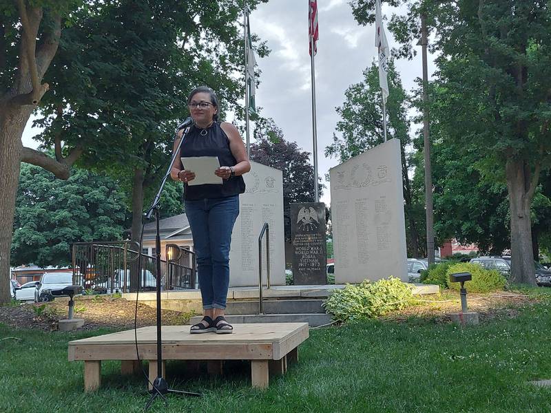 Mony Ruiz-Velasco, deputy director of Equality Illinois, speaks Friday, June 7, 2024, at Washington Square in Ottawa during Pride Night of Remembrance.