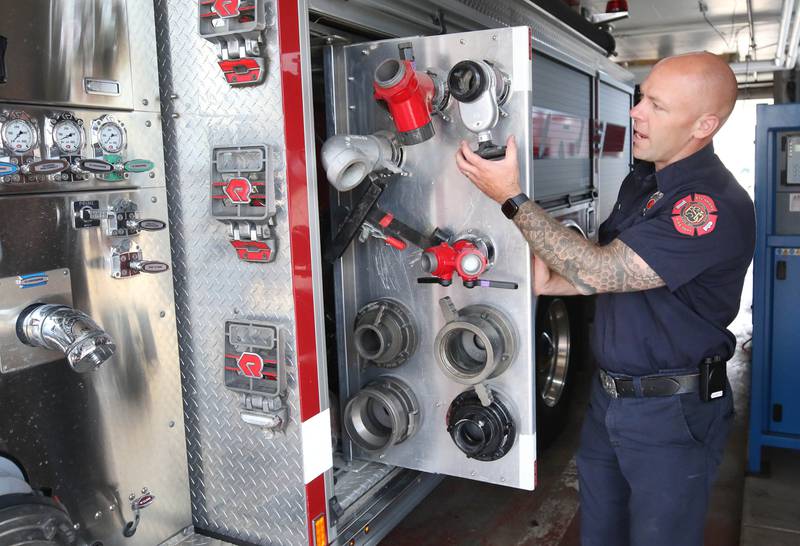 Ian Wheeler, a Sycamore firefighter/paramedic, talks about the capabilities of the one of the fire engines Tuesday, June 11, 2024, at Sycamore Fire Station 1.