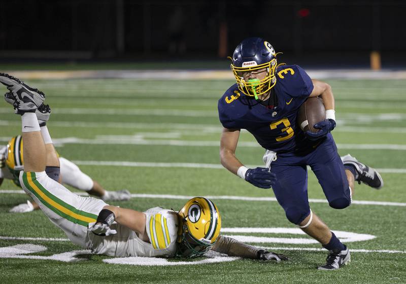 Sterling’s Cobey Shipma avoids a tackle against Geneseo Friday, Oct. 4, 2024, at Sterling High School.