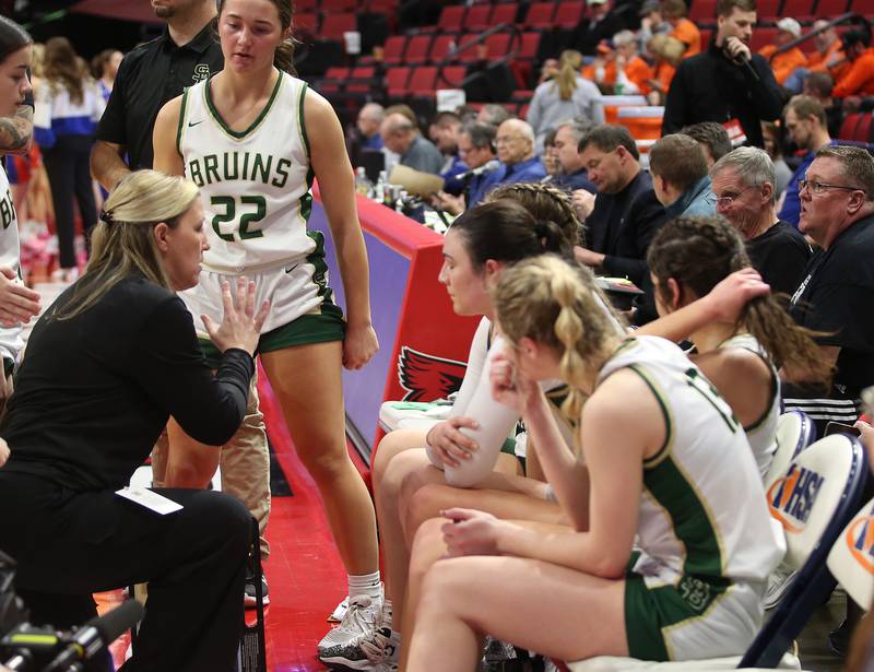 St. Bede head girls basketball coach Stephanie Mickley talks to her team during a timeout in the Class 1A State semifinal game on Thursday, Feb. 29, 2024 at CEFCU Arena in Normal.