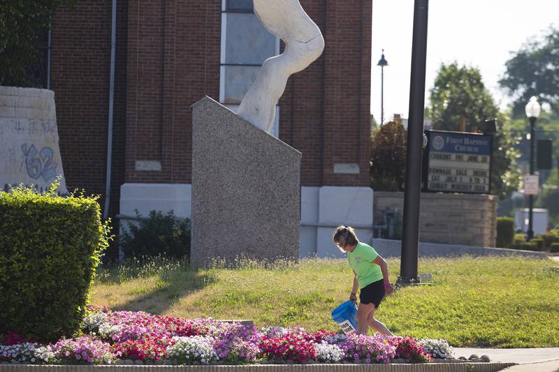 Debbie Nagy checks out Wings of Peace park Thursday, July 6, 2023 in Dixon during a monthly clean up day in Dixon. A clean up crew is needed for the first Thursday of the month event. Most volunteers are from the Rock River Garden Club.