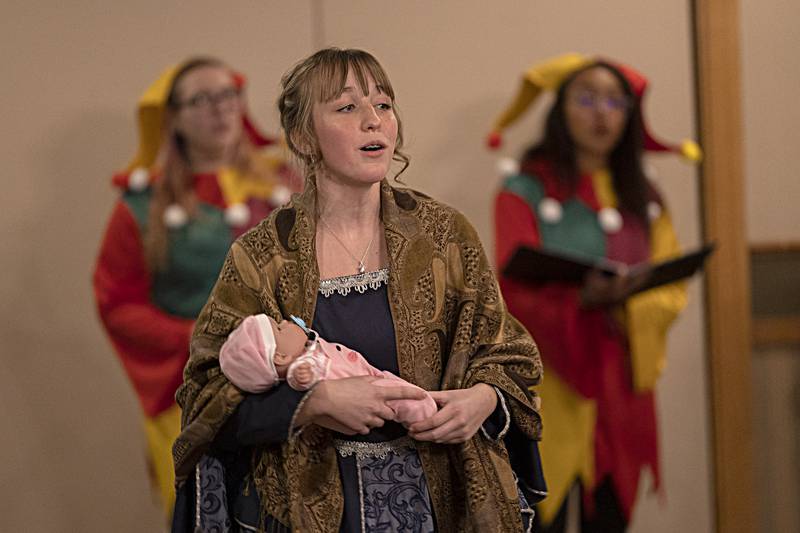 Mary, played by MyKaylah Kirby, performs a scene Thursday, Dec. 21, 2023 during Dixon High School’s Madrigal dinner.