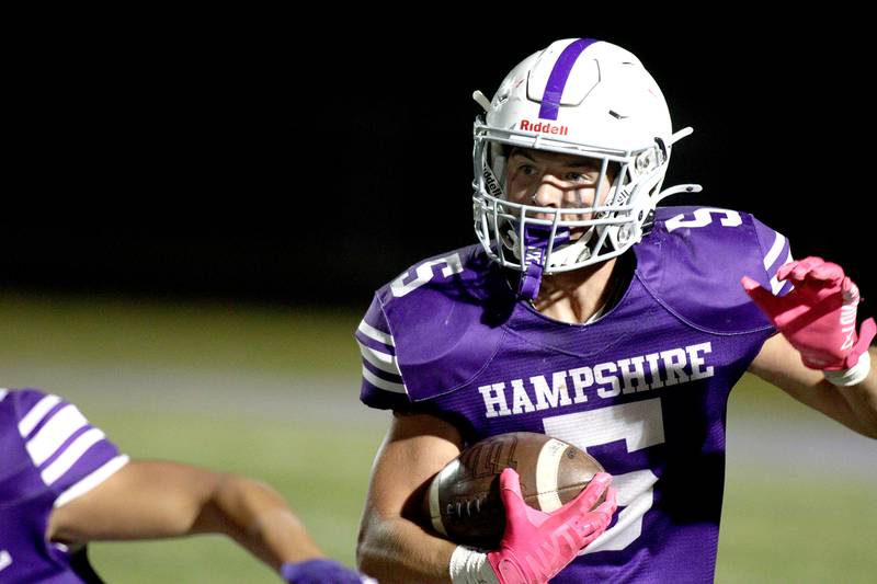 Hampshire’s Christian Dupuis runs the ball against Jacobs in varsity football on Friday, Sept. 6, 2024, at Hampshire School in Hampshire.