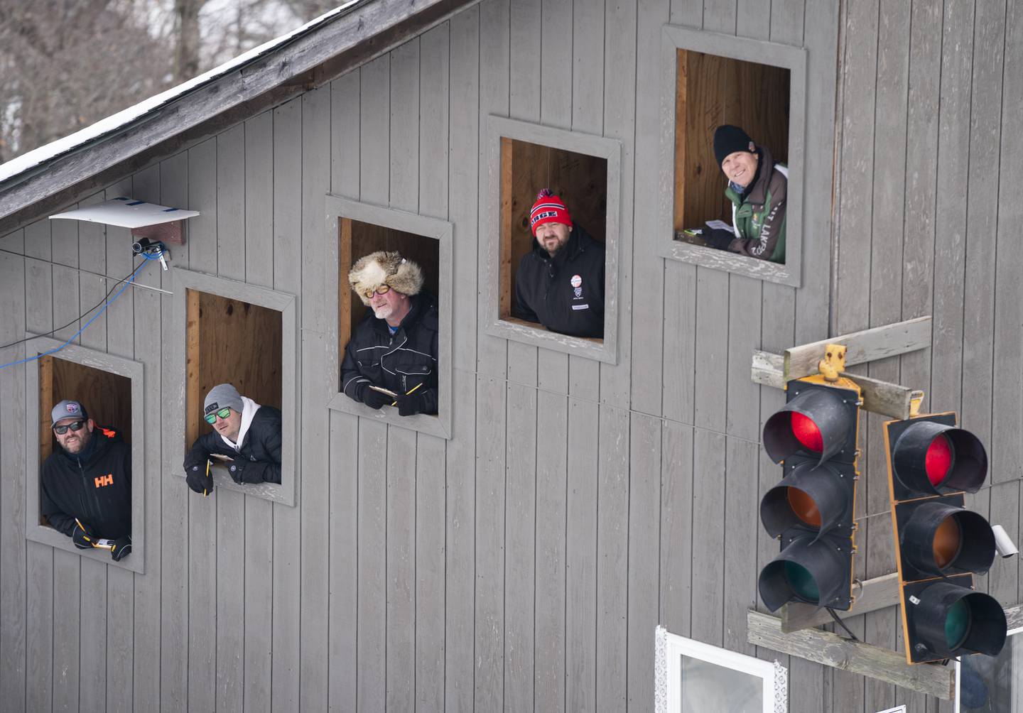 Judges watch ski jumpers as they compete during the 117th annual Norge Winter Ski Jump Tournament on Sunday, Jan. 30, 2022 in Fox River Grove.