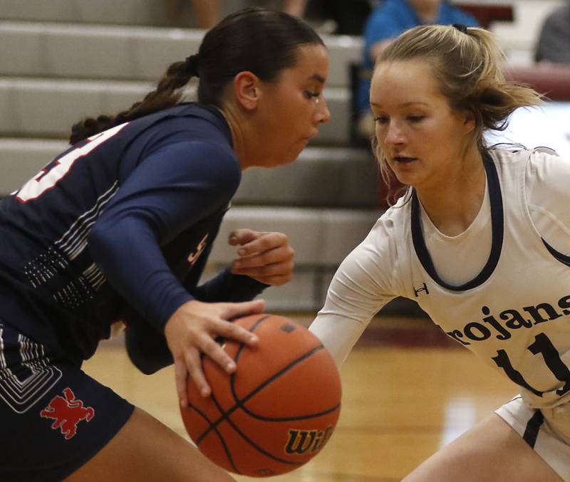 Cary-Grove's Kayli McMorris tries to steal the ball from St. Viator's Mia Bergstrom during an IHSA Class 3A Antioch Sectional semifinal girls basketball game on Tuesday, Feb. 20, 2024, at Antioch High School.