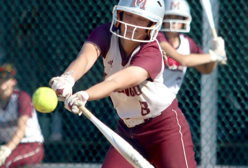 Marengo’s Gabby Gieseke makes contact against North Boone in IHSA Softball Class 2A Regional Championship action at Marengo Friday.