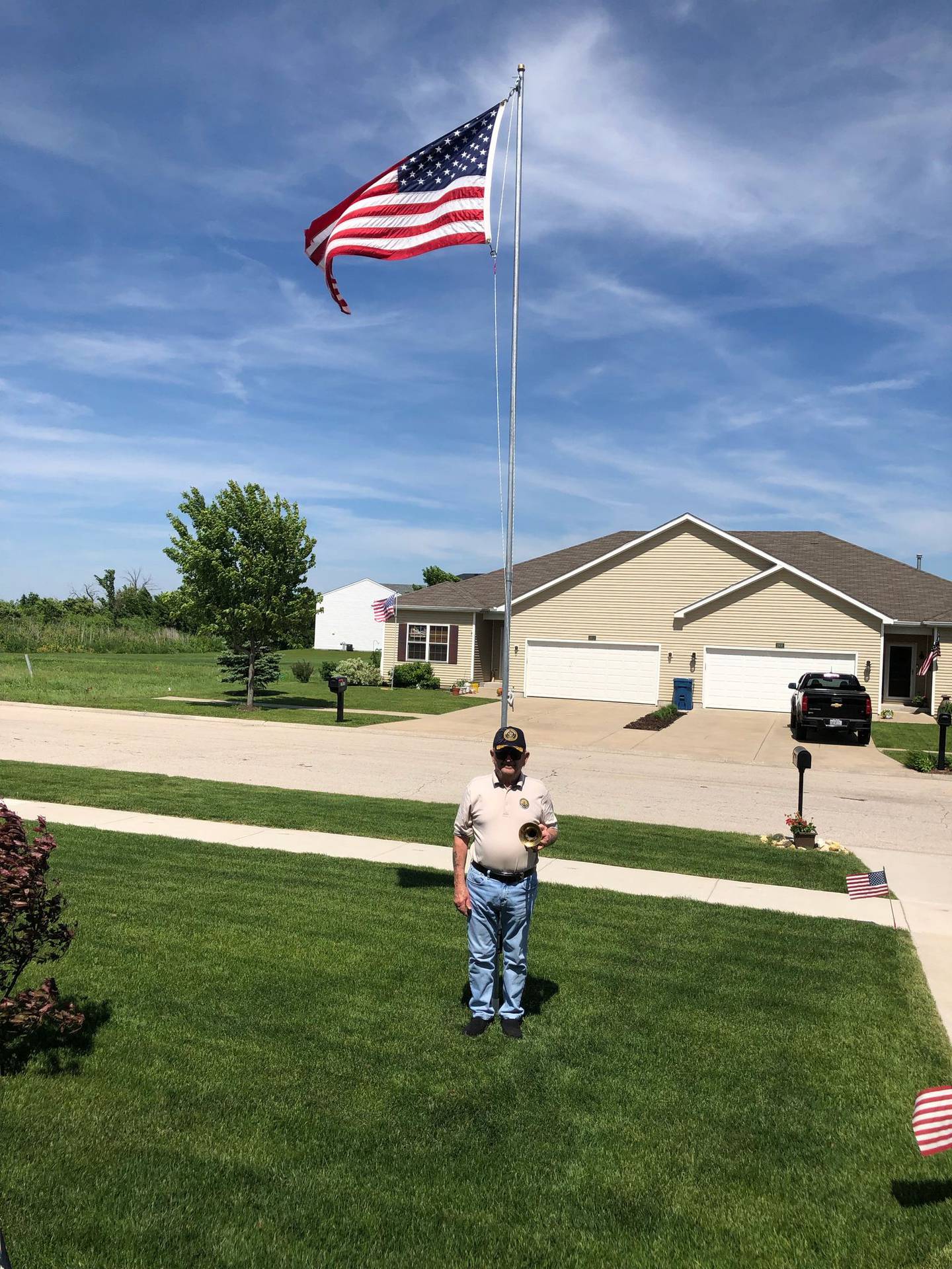 James McElroy of Morris is a proud Navy veteran. He flies a U.S. flag year-round and plays taps on Memorial Day as part of Taps Across America.
