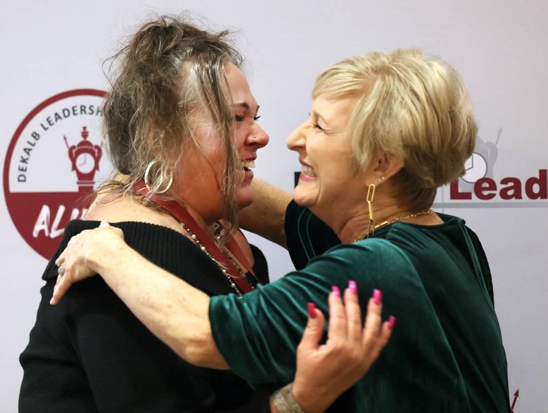 Shauna Stevens (left) accepts the Ambassador of the Year award from last years winner Celine Bennetts Thursday, Feb. 8, 2024, during the DeKalb Chamber of Commerce’s Annual Celebration Dinner in the Barsema Alumni and Visitors Center at Northern Illinois University.