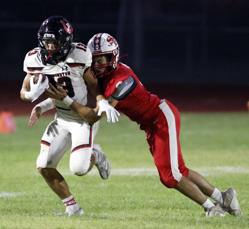 Barrington's Jacob Dorn (13) moves up field with South Elgin's Vinny Tusa (9) attached to him Friday, Aug. 30, 2024 in South Elgin.