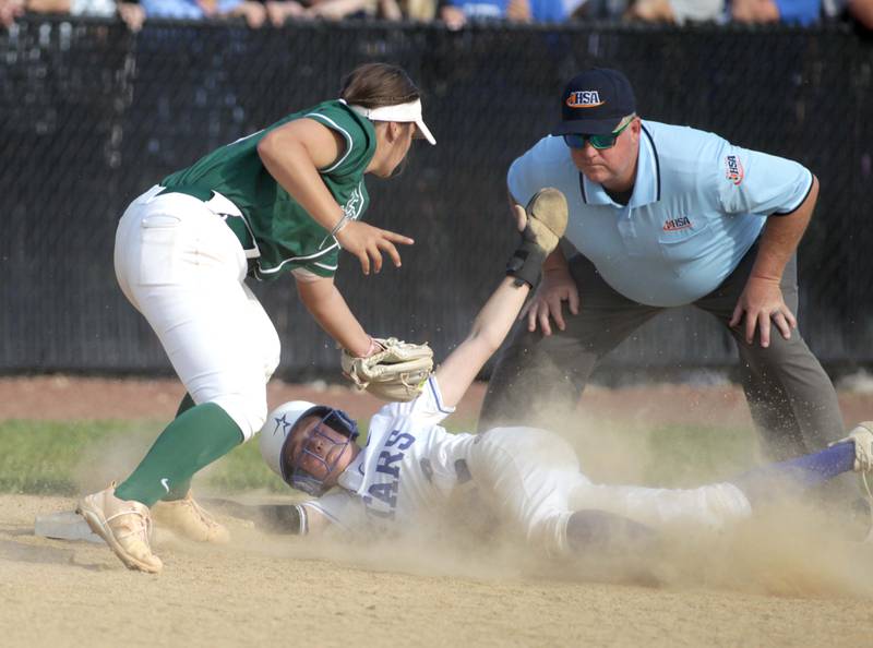 St. Charles North’s Julia Larson slides under the tag from Fremd’s Sydney Sheedy during a Class 4A St. Charles North Sectional semifinal on Tuesday, May 30, 2023.