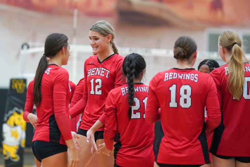 Benet’s Lynney Tarnow (12) smiles after scoring a point during a volleyball match against Metea Valley at Metea Valley High School in Aurora on Wednesday, Sep 4, 2024.