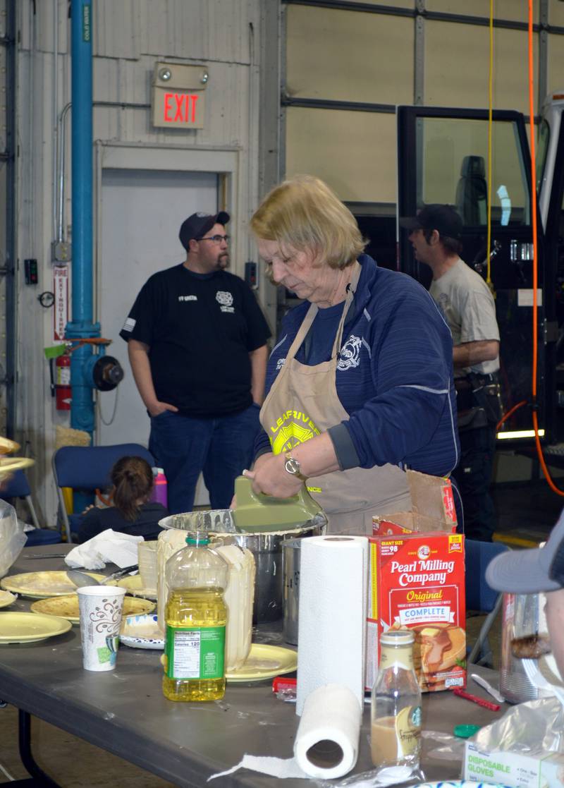 Leaf River Fire Protection District EMT Nina Morning prepares another batch of pancake batter on Feb. 25, 2023, during the annual Leaf River Firemen's Pancake Supper. A little over 700 people attended the fundraiser at the Leaf River fire station, raising $2,050.