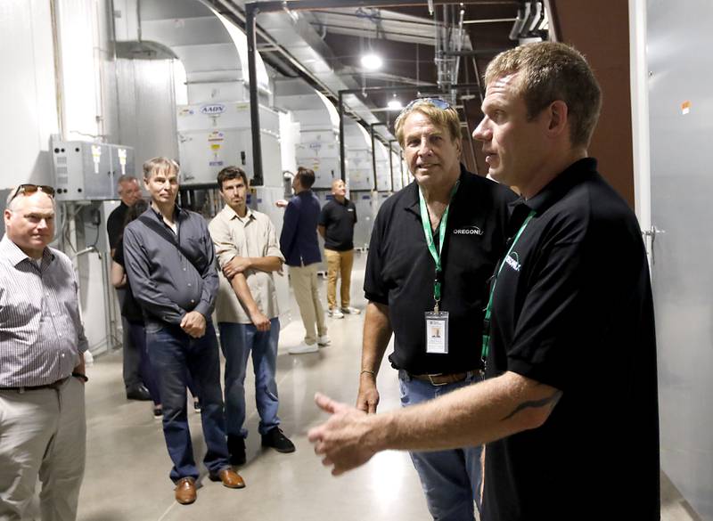 Oregonix Farms COO Owen Papworth (right) and CEO David Schwimmer talk about the craft grow facility during a tour of  Oregonix Farms' new craft grow facility in Huntley on Friday, July 14, 2023.