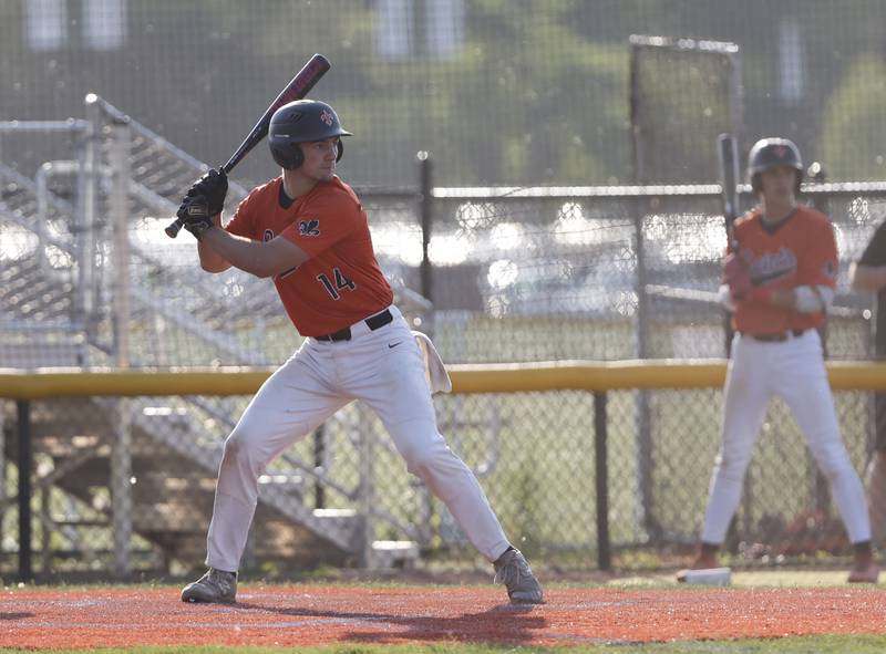 St. Charles East's Mac Paul (14) waits for a pitch during the Class 4A York regional semi-final between Wheaton Warrenville South and St. Charles East in Elmhurst on Thursday, May 23, 2024.