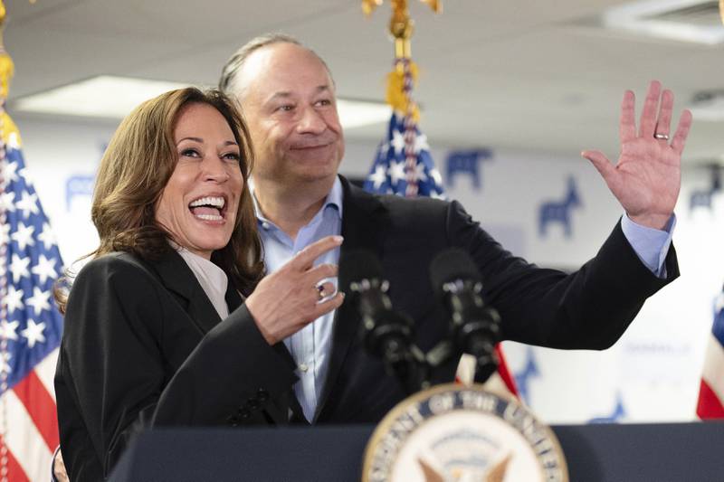 Vice President Kamala Harris, left, and second gentleman Doug Emhoff address staff at her campaign headquarters in Wilmington, Del., Monday, July 22, 2024. (Erin Schaff/The New York Times via AP, Pool)