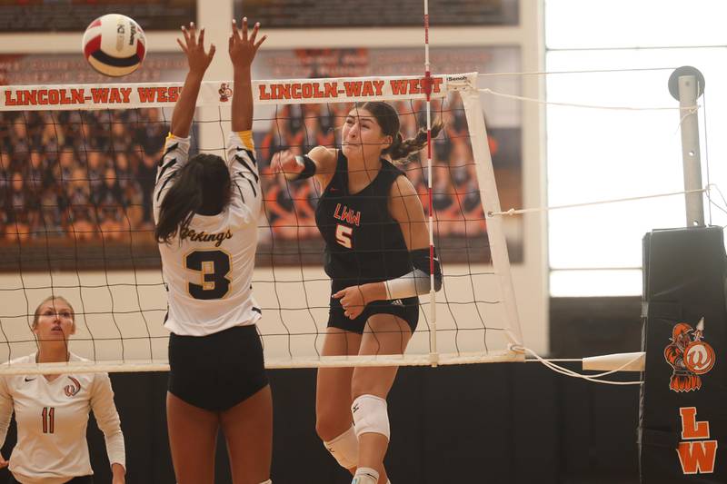 Lincoln-Way West’s Caroline Smith powers a shot against St. Laurence on Monday, August 26, 2024 in New Lenox.