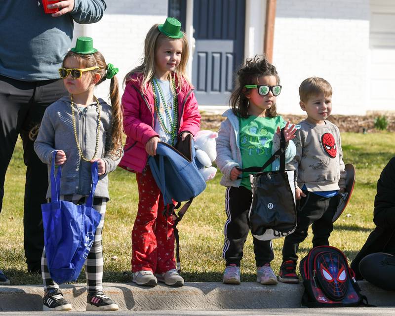 Bella Cross, 4, Lily Diorio, 5, Frankie Cross, 2, and Duke Diorio, 3, all of Countryside are all ready for the St. Patrick’s Day parade in and wait for any candy that is thrown their way on Saturday March 2, 2024 in Countryside.