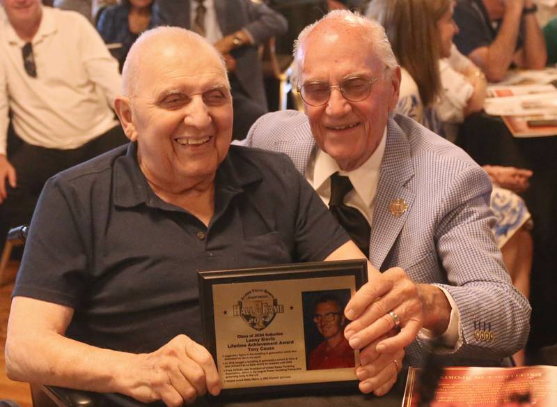 Tony Causa poses with emcee Lanny Slevin with the Lanny Slevin Lifetime Achievement Award during the  Illinois Valley Sports Hall of Fame awards banquet on Thursday, June 6, 2024 at the Auditorium Ballroom in La Salle.