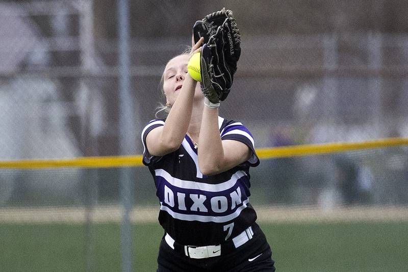 Dixon’s Aly Moore hauls in a fly ball against Newman Thursday, April 11, 2024 at Reynolds Field in Dixon.