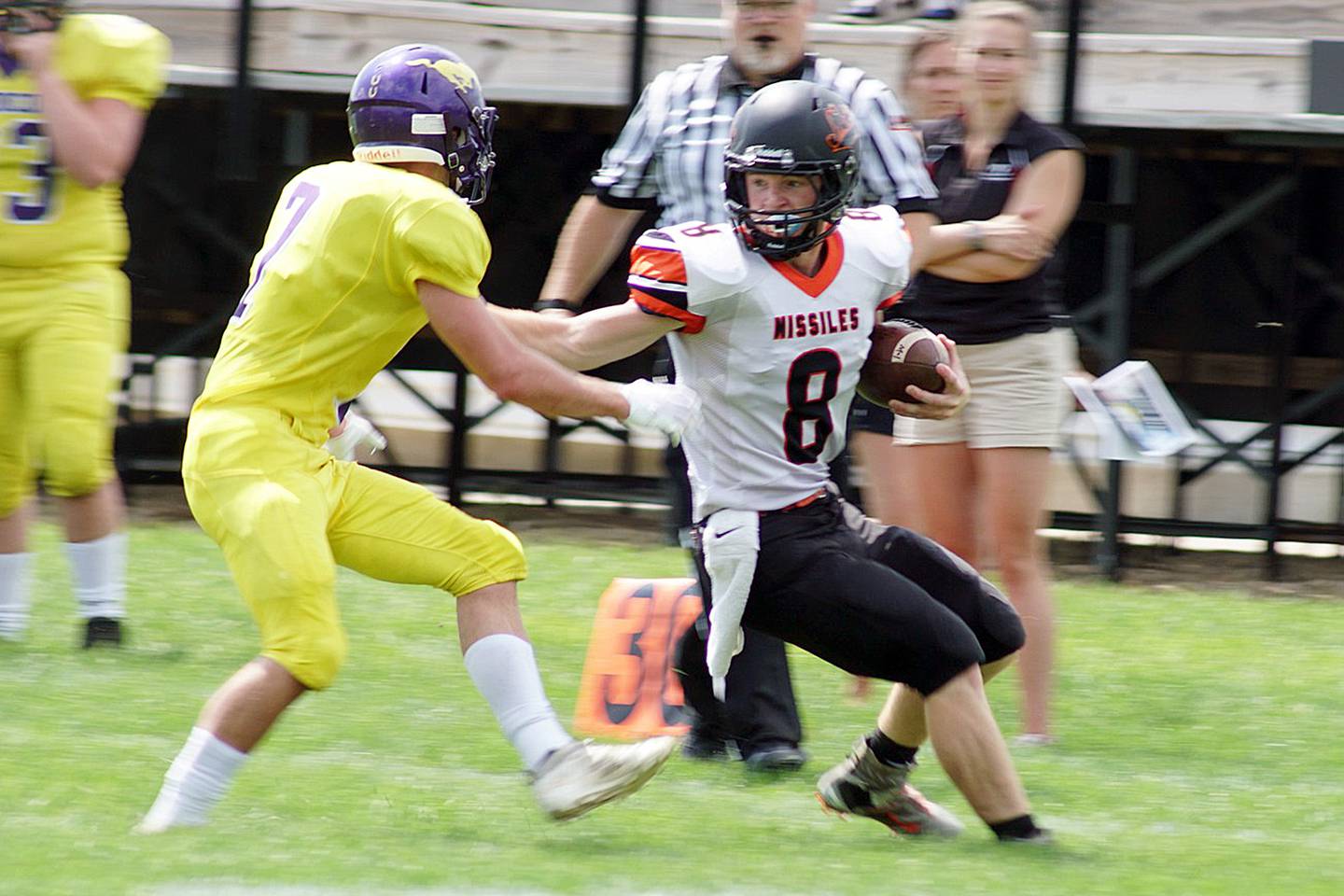 Milledgeville's Connor Nye looks to break a tackle Saturday, Aug. 27, 2022 against Orangeville.