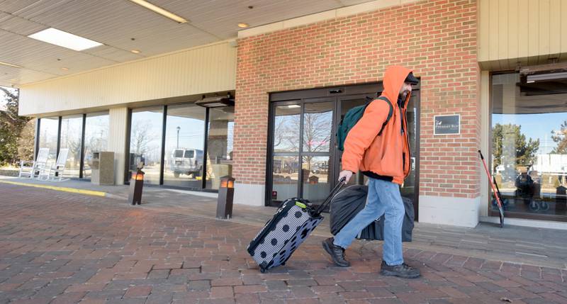 Al Visco of West Chicago checks out of the Pheasant Run Resort on Saturday Feb. 29, 2020 after staying one last night with his family.