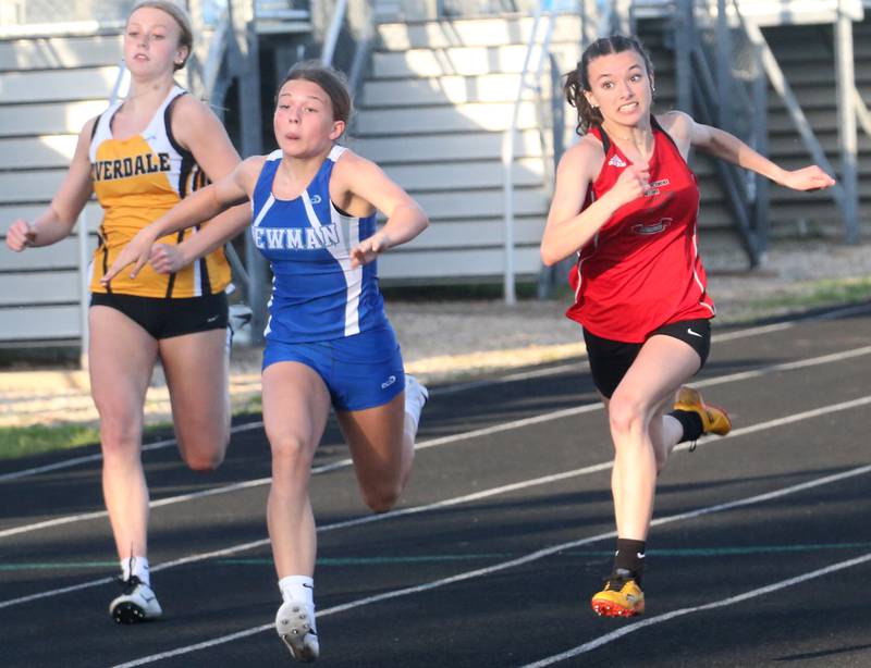 Riverdale's Preslie Willemkens, Newman's Elaina Allen and Henry-Senachwine's Daniella Bumber run in the 100 meter dash during the Class 1A Sectional meet on Wednesday, May 8, 2024 at Bureau Valley High School.