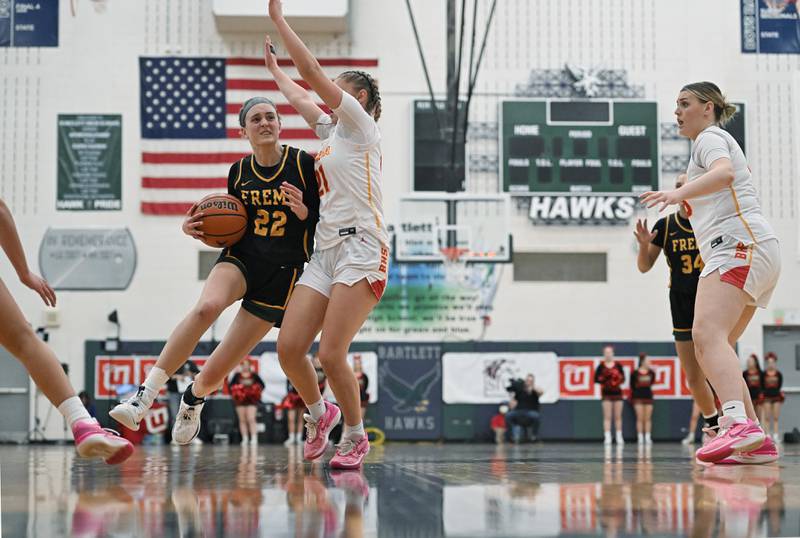 Fremd’s Ella Todd tries to get past Batavia’s Kylee Gehrt in the Bartlett supersectional game on Monday, Feb. 26, 2024.