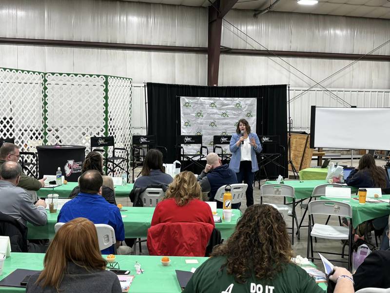 Katie Pratt, Lee County Ag in the Classroom Coordinator and Amboy FFA Alumni secretary, speaks to attendees about her personal experience in FFA and Agricultural Education courses.