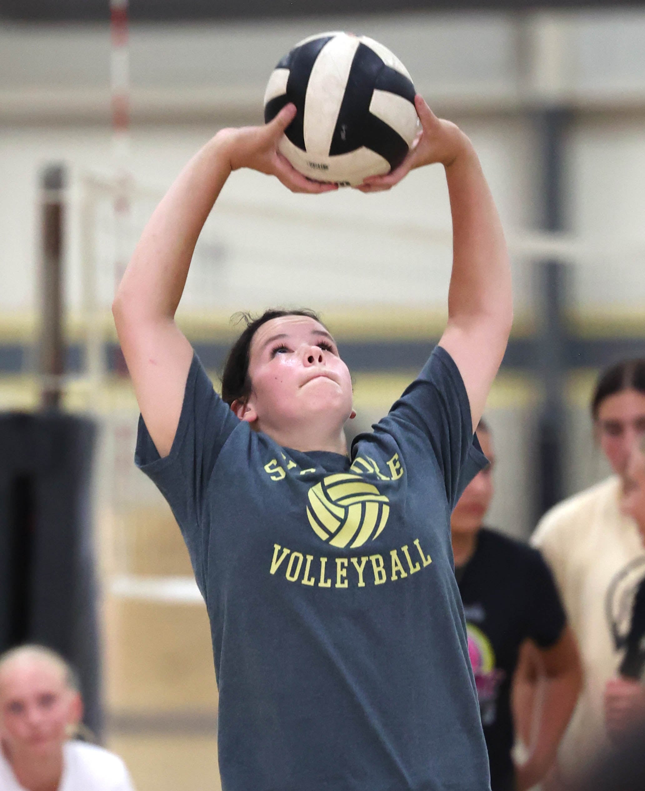 Eleanor Klacik sets the ball during a drill at Sycamore High School volleyball camp Tuesday, July 23, 2024, at Sycamore High School.