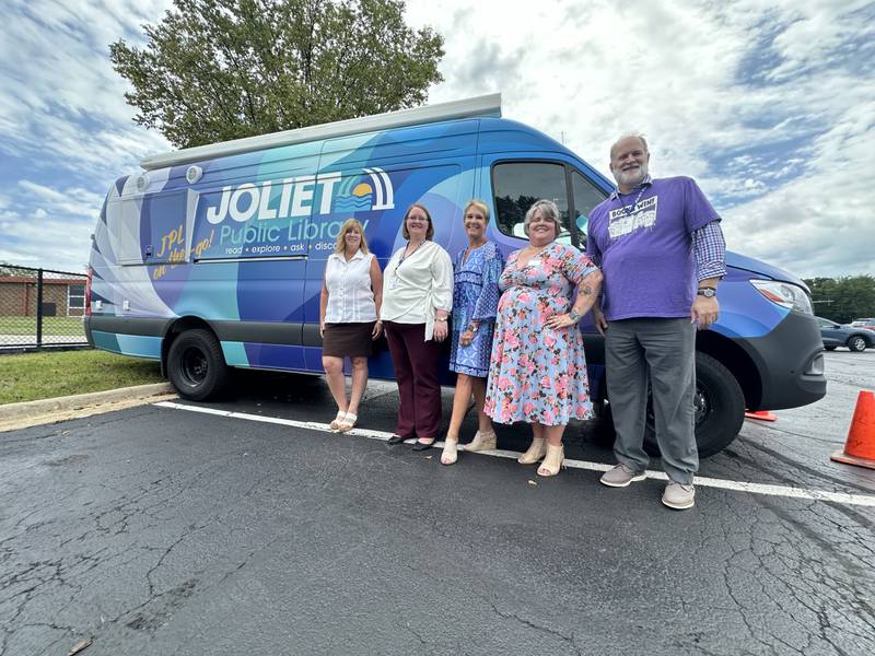 Come out to Kidz Fest on Saturday and see the Joliet Public Library’s new outreach van: JPL On-the-Go. Pictured, from left, are Executive Director Megan Millen, Youth Services Manager Laura Yanchick, Special Projects Coordinator Val Devine, Adult Services Manager Lesley Rose and Deputy Director Jim Deiters.