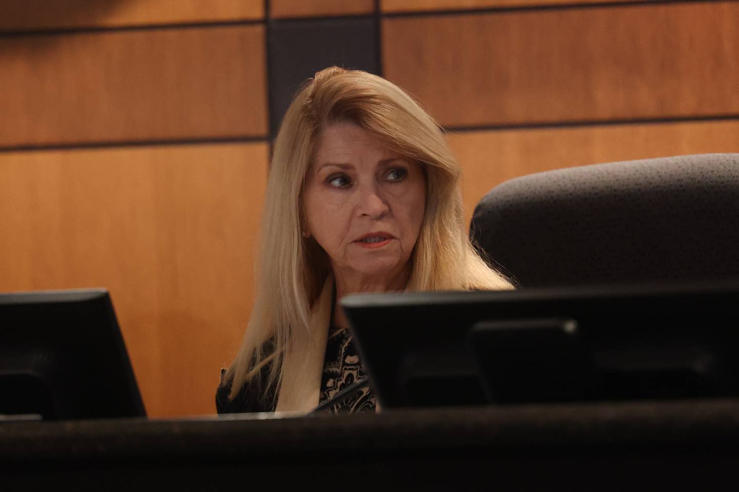 Council at Large Jan Hallums Quillman sits in on a hearing on the validity of nominating petitions of two City Council candidates at the Joliet City Electoral Board meeting on January 4th.