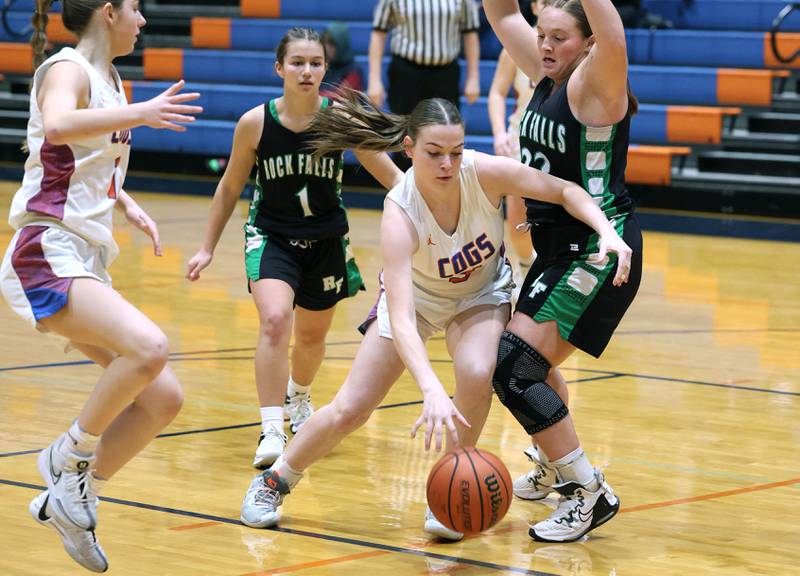 Genoa-Kingston's Zoe Boylen goes around Rock Falls' Denali Stonitsch during their game Friday, Feb. 2, 2024, at Genoa-Kingston High School.