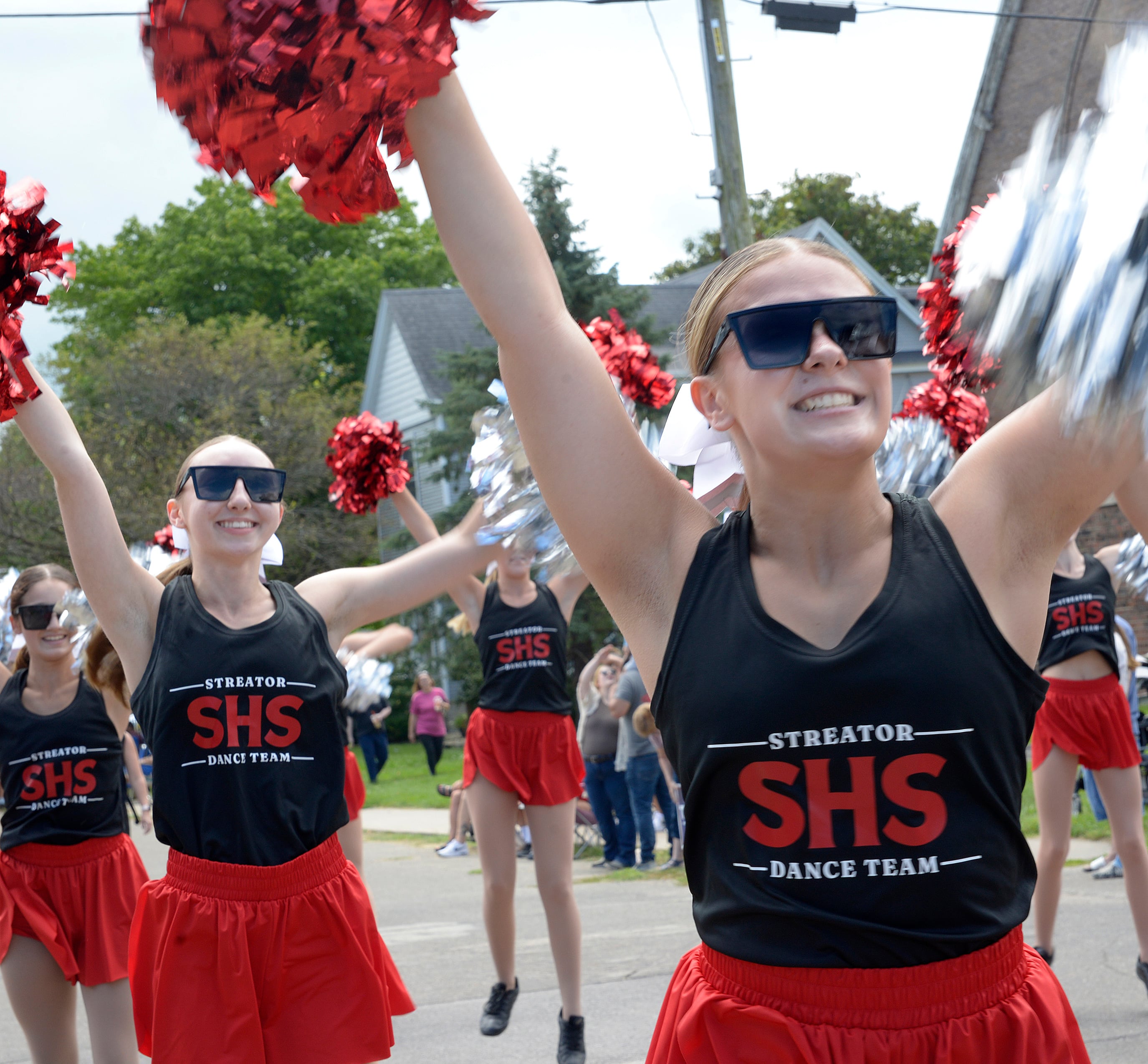 The Streator High School Dance Team entertains the crowd Sunday, Aug. 18, 2024, along the parade route during the Community Fest Parade in Grand Ridge.