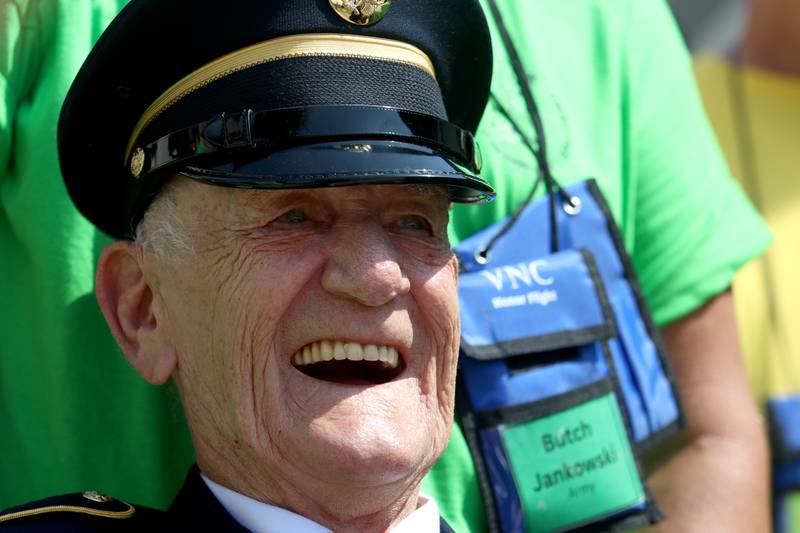 Army veteran Ben Jankowski of Woodstock smiles as McHenry Community High School hosted a celebration Sunday for veterans returning from an Honor Flight trip to Washington D.C. The Honor Flight trip was coordinated by the Veterans Network Committee of Northern Illinois.