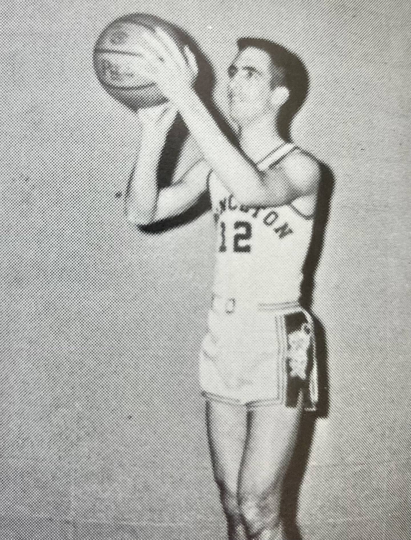 Roger Angel, a 1962 graduate, takes aim for the Tigers.