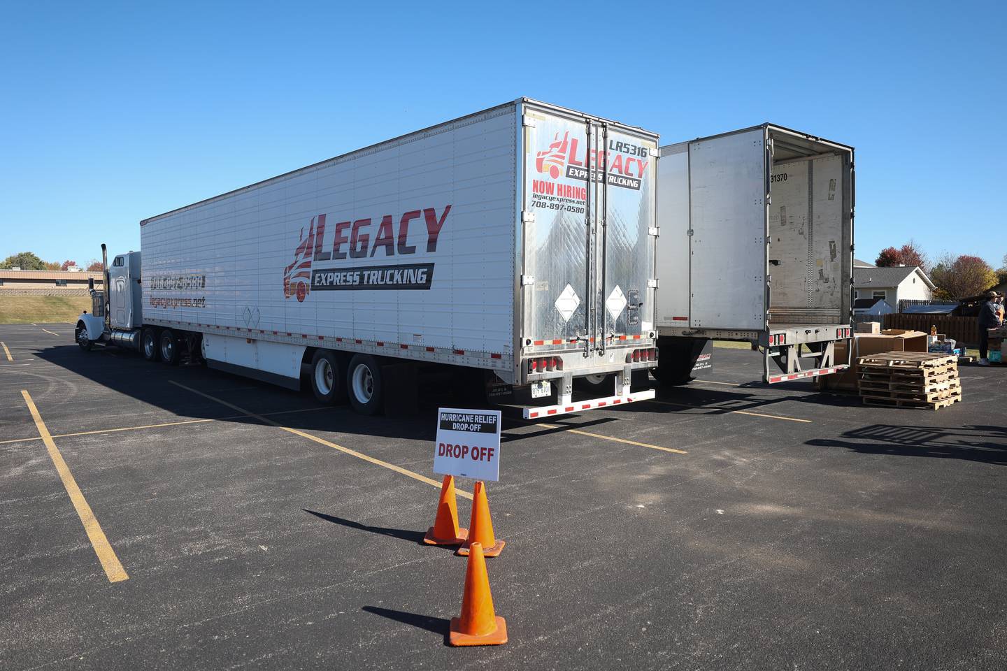 Donations are loaded into a second trailer after the first one is filled to be delivered to Bristol Motor Speedway, Tennessee for the victims of Hurricanes Helene and Milton at the City of Joliet and Cadence Cares Foundation relief drive on Saturday, Oct. 19, 2024 in Joliet.